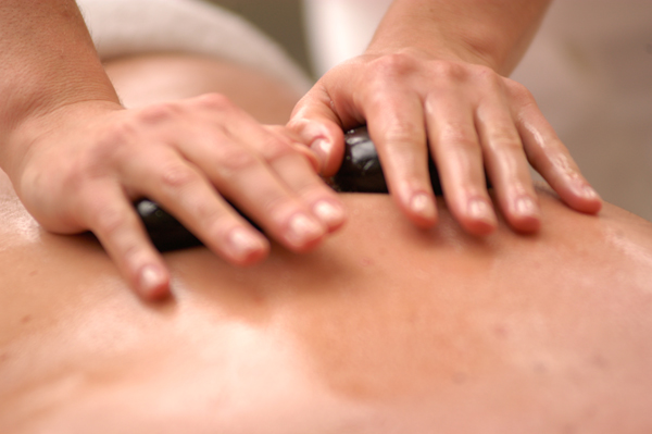 Hot stone massaging